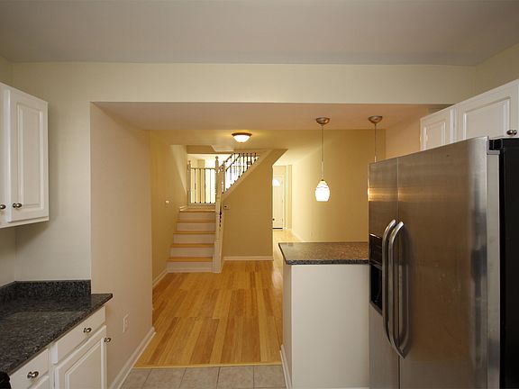 Separate dining room with bamboo floors