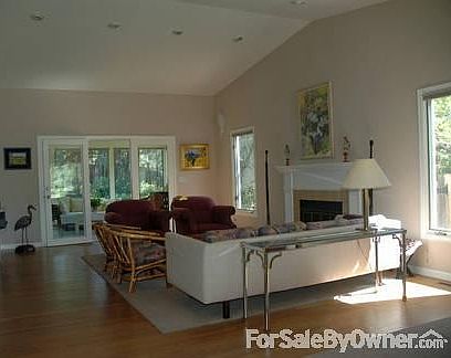 Living Room
						:
						Vaulted ceiling, spacious, view to sunroom and back yard.