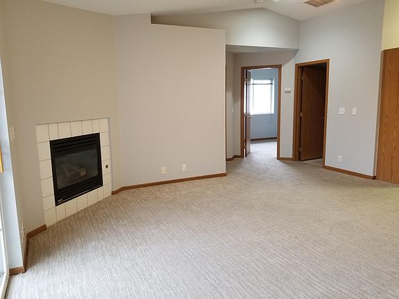 living room with hallway to bath and 2 bedrooms