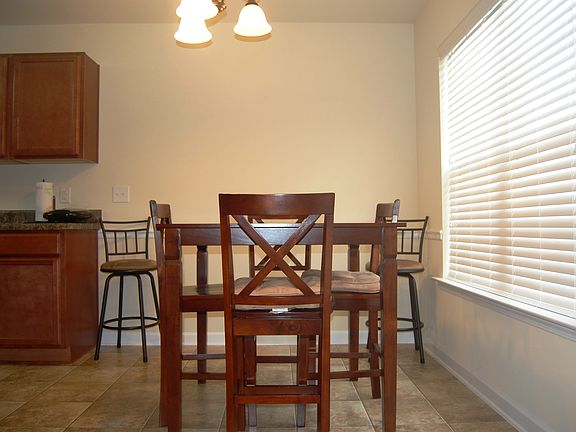 Dining area in kitchen with natural lighting