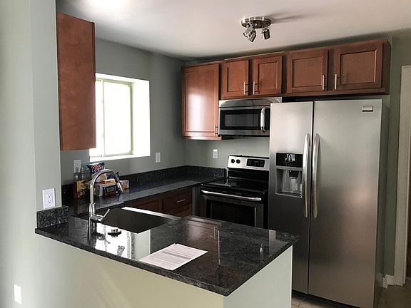 Fully equip Kitchen w/ stainless steel appliances Spacious & Granite counter tops