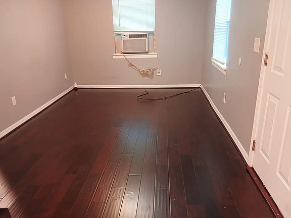 Newly installed vinyl plank flooring throughout