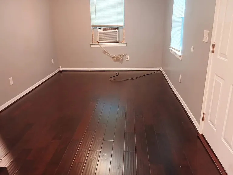 Newly installed vinyl plank flooring throughout