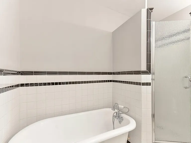 Clawfoot tub in primary bathroom