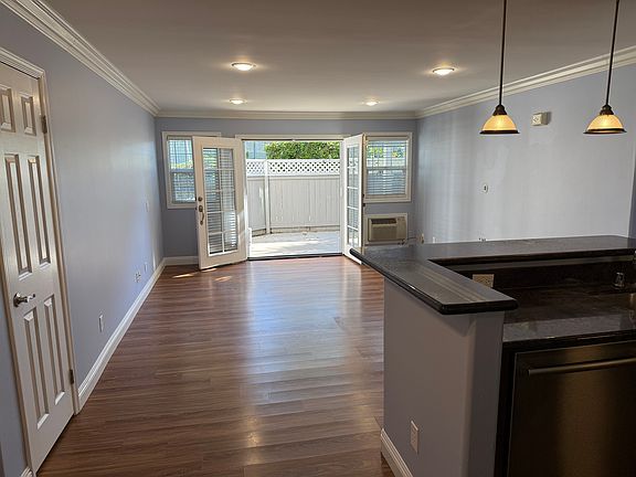 Living Room with French Doors leading to patio. Extra closet.