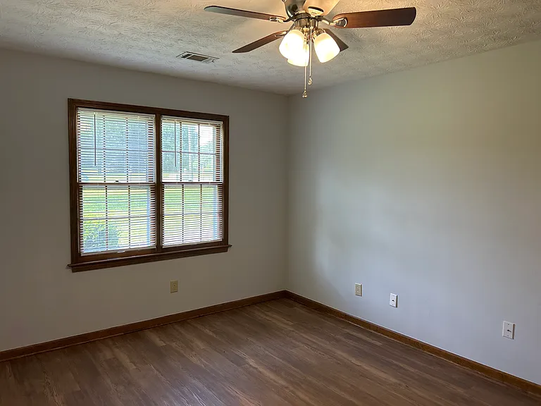 Master bedroom with new ceiling fan