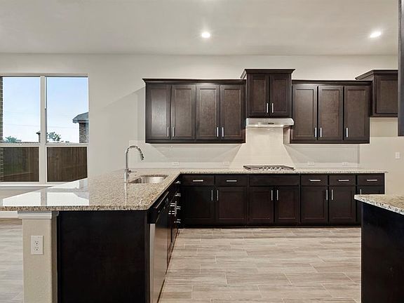 All Photos shown here may not depict the specified home & features included are for illustration purposes only.