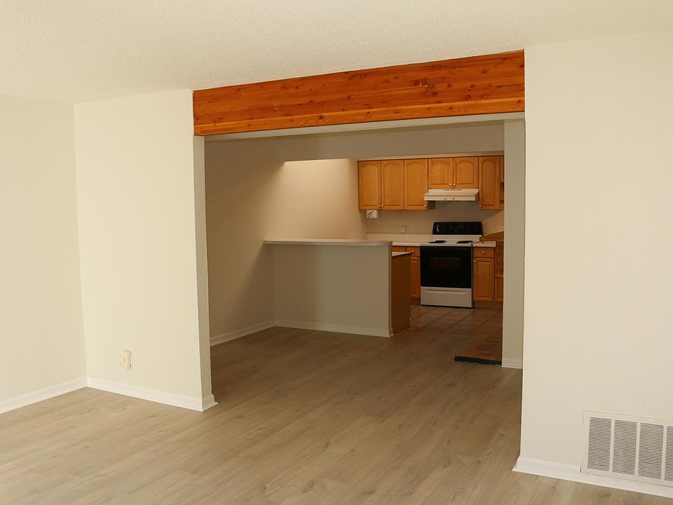 View from living room through dining/flex space to kitchen