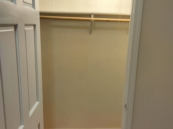 view into bedroom closet