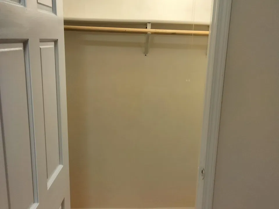 view into bedroom closet