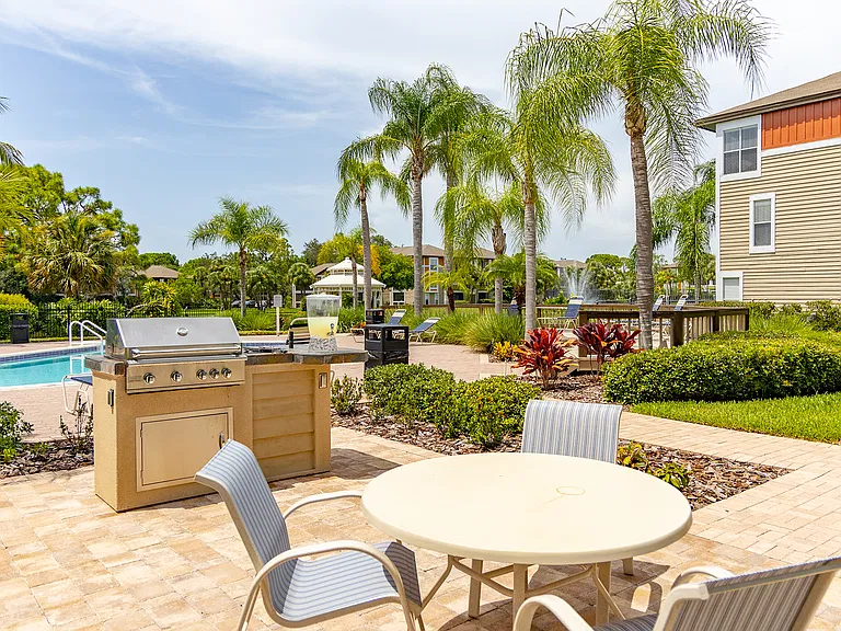 Poolside BBQ grill and picnic areas