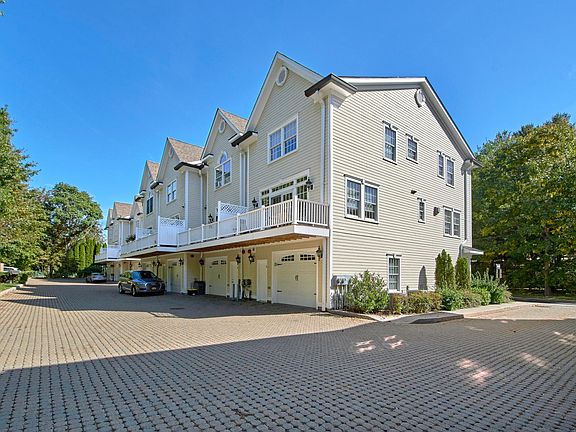 Large parking area. Each unit has a garage, the parking area in front of garage and an assigned spot.