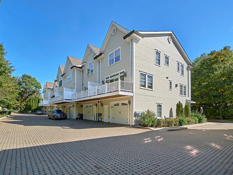 Large parking area. Each unit has a garage, the parking area in front of garage and an assigned spot.