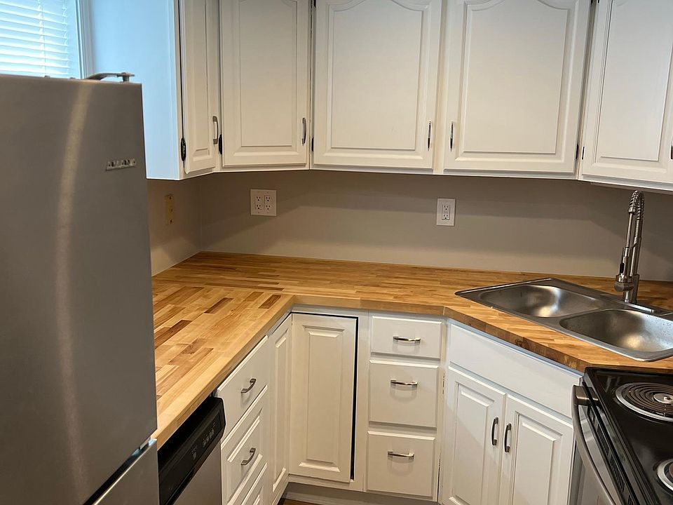 Updated kitchen with new appliances , dishwasher, and countertops.