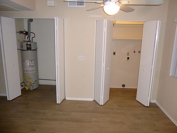 Laundry hookups, water heater and pantry area