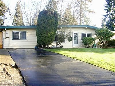 Front of home, one of two driveways
