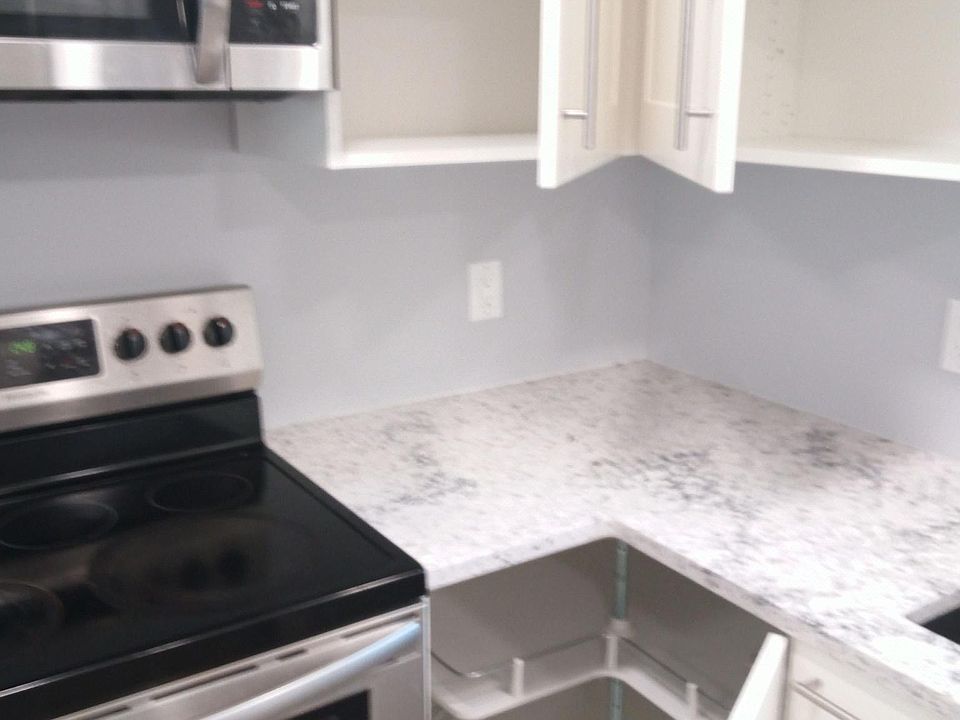 Tons of storage, Glass top 4 burner stove