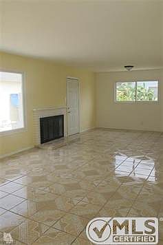 Spacious Living Room with Fireplace.