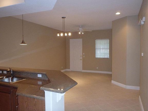 Living room with fresh new paint including baseboards.