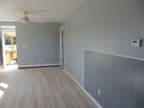 Living room and small area for kitchen table.
