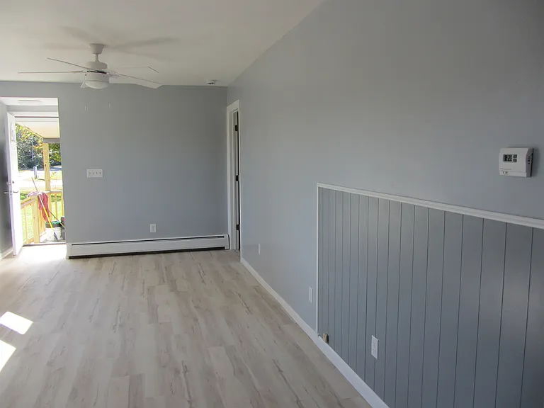 Living room and small area for kitchen table.