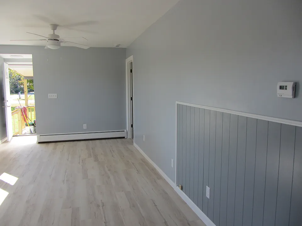Living room and small area for kitchen table.