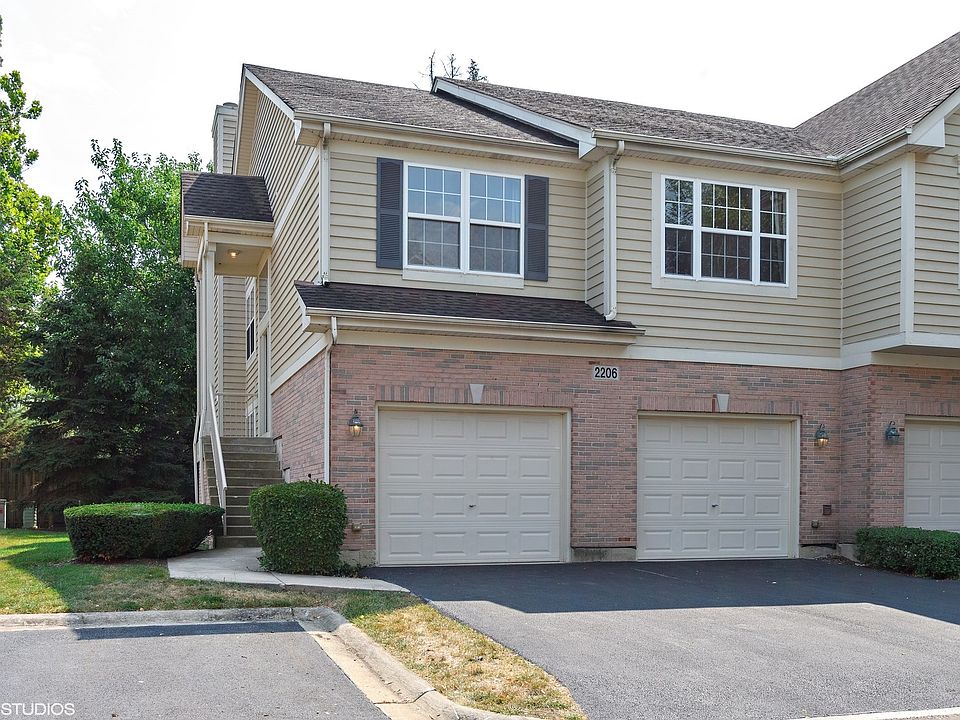 Front of home from Grove Court - showing Front Door & Garage access.