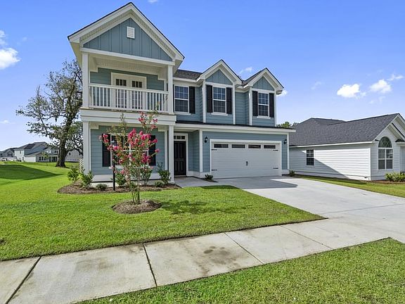 Photos are of a similar home