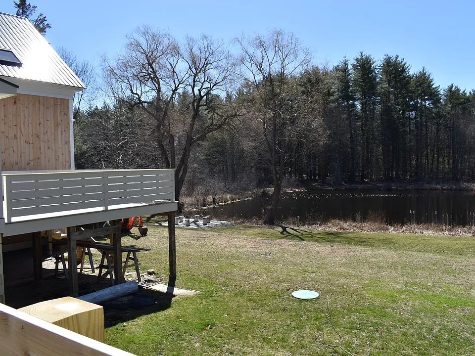 Backyard & Partial Pond view, deck is part of Unit 3 and not part of the rental space of Unit 1.