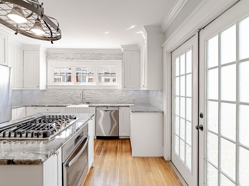 Kitchen with French doors to the large deck and backyard