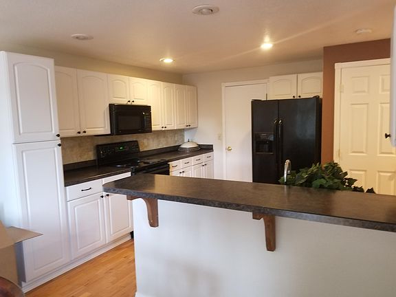 Kitchen with pantry and entrance to garage