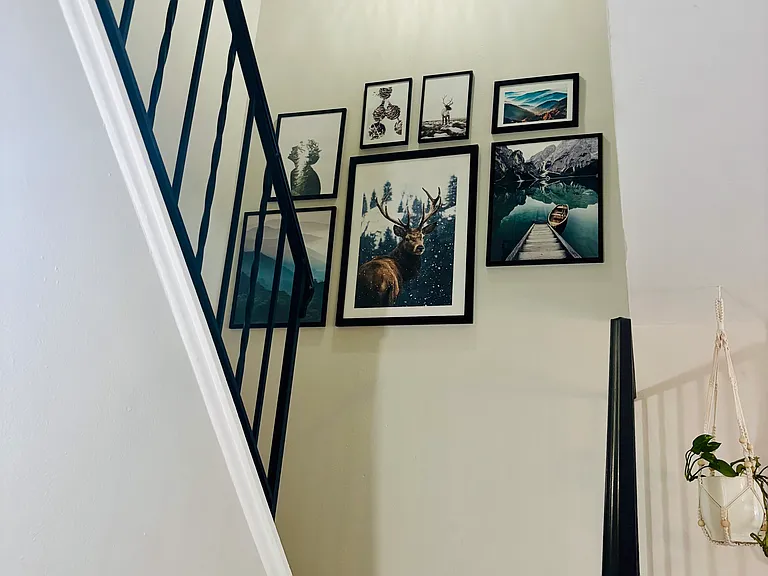 Stairs Leading to both Bedrooms and the Full bath
