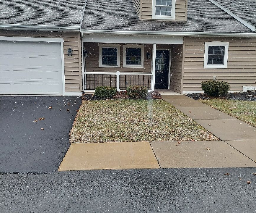 Exterior front of home with porch.