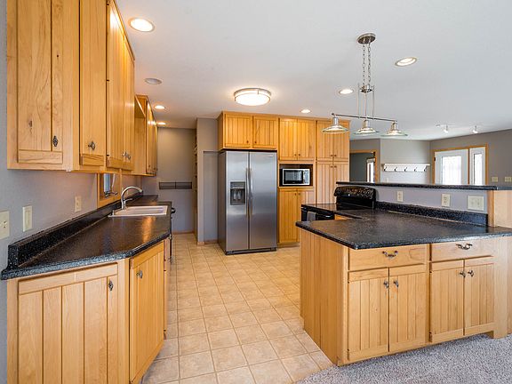 Kitchen and breakfast bar