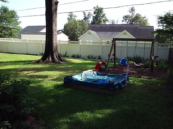 Large shaded back yard area