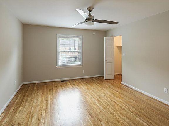 Large Master bedroom with two closets and ceiling fan!