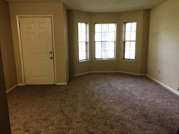 Den area with a large window