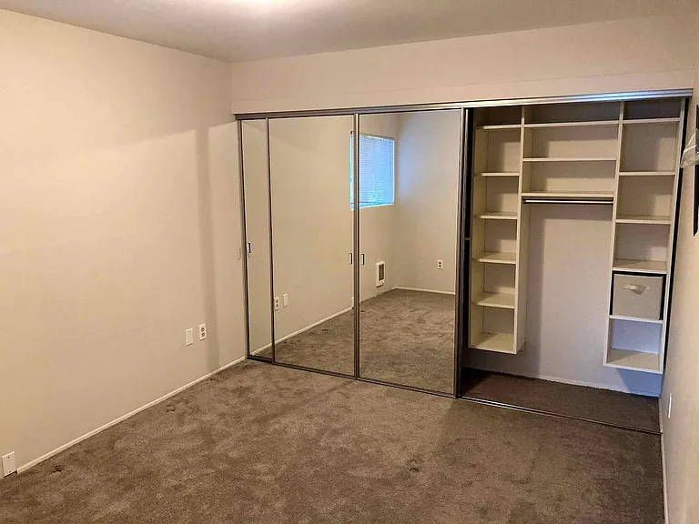 Bedroom #1 w/ closet organizer