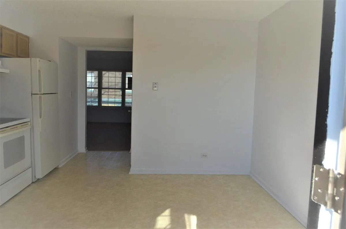 Building Photo - 9240 E Girard Ave #5