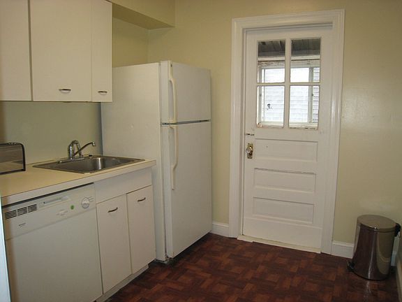 Rear door, with shed, and stairs to side yard