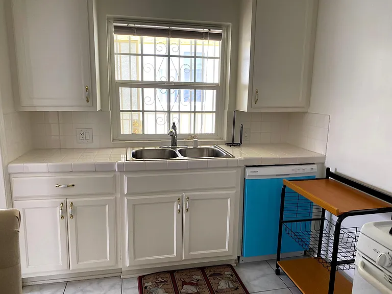 7711 Romaine St #7711 — Photo 1
