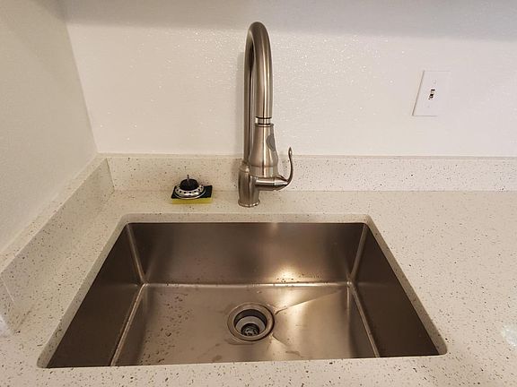 Quartz counter tops with a deep sink