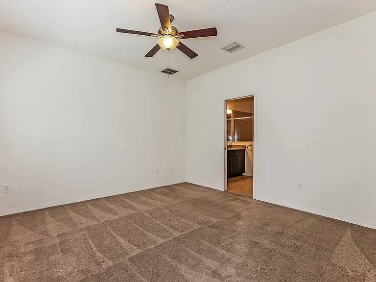 8309 Deerland Bluff Ln — Photo 10