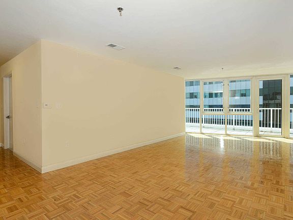 Living Room with Hard Surface Flooring and Balcony