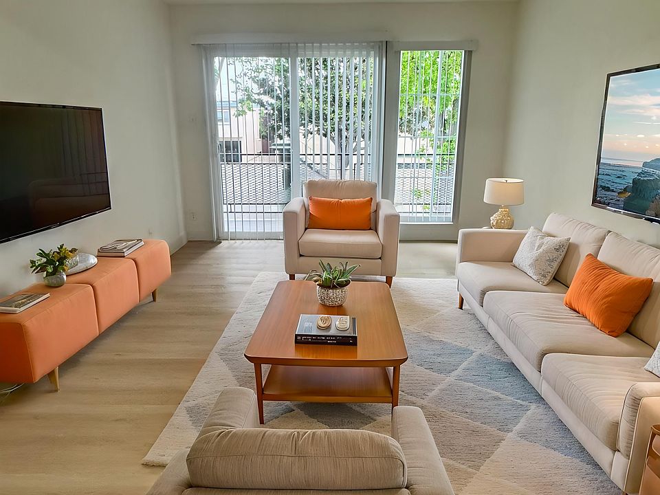Spacious living room with new luxury vinyl flooring.