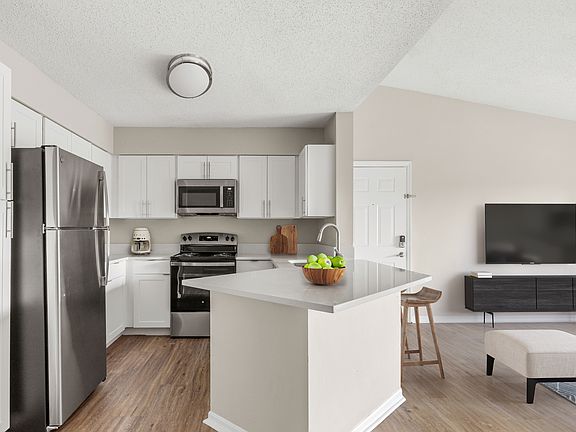 Kitchens featrure modern stainless-steel appliances, granite-inspired countertops, and stylish finishes designed for comfort and convenience