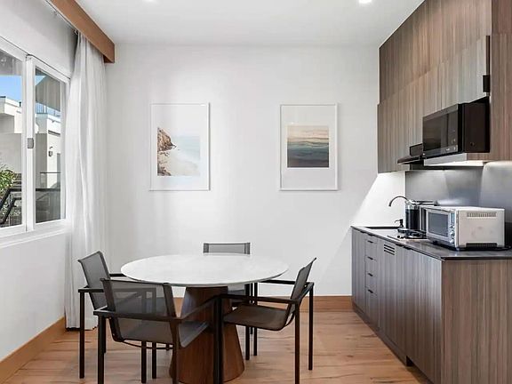 The stunning kitchenette and dining nook, allow you to feel right at home.