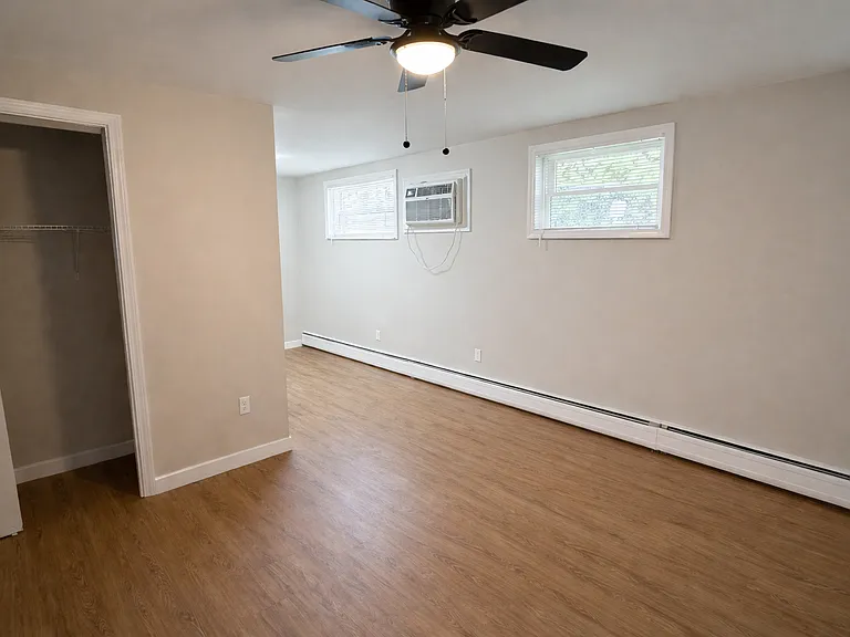 Spacious living room with large closet