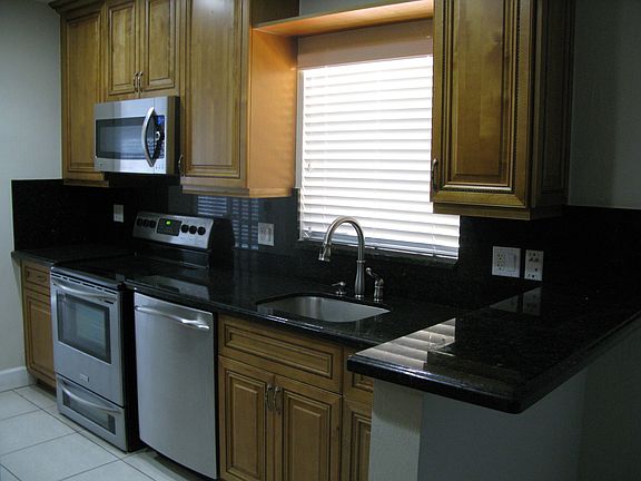 Kitchen stove & dishwasher side