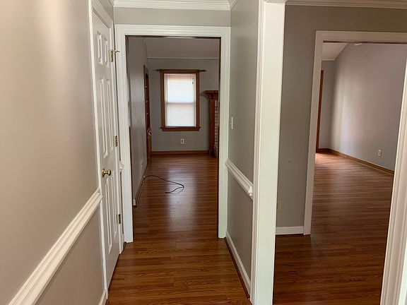 Foyer with LR to right & Den ahead